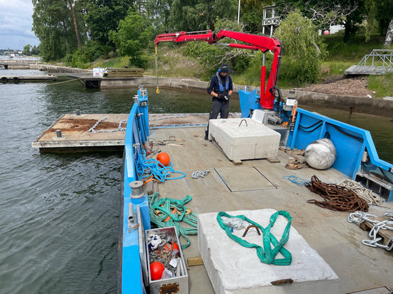 Bojstenar och betongankare för flytbetong ponton och bryggor i stockholms skärgård